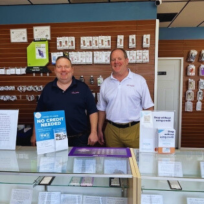 Quest Wireless storefront at 7234 Wornall Road in Kansas City offering phone repairs, used phones, and wireless service plans